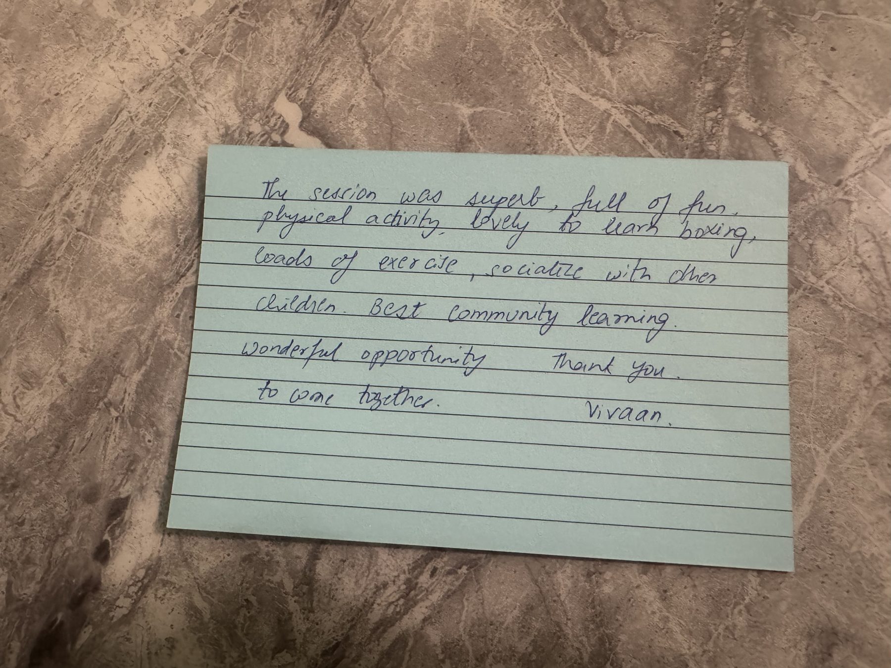 Handwritten feedback card: The session was superb, full of fun, physical activity. Lovely to learn boxing, loads of exercise, socialise with other children. Best community learning. Wonderful opportunity to come together. Thank you.